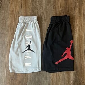 Two pairs boys Jordan shorts